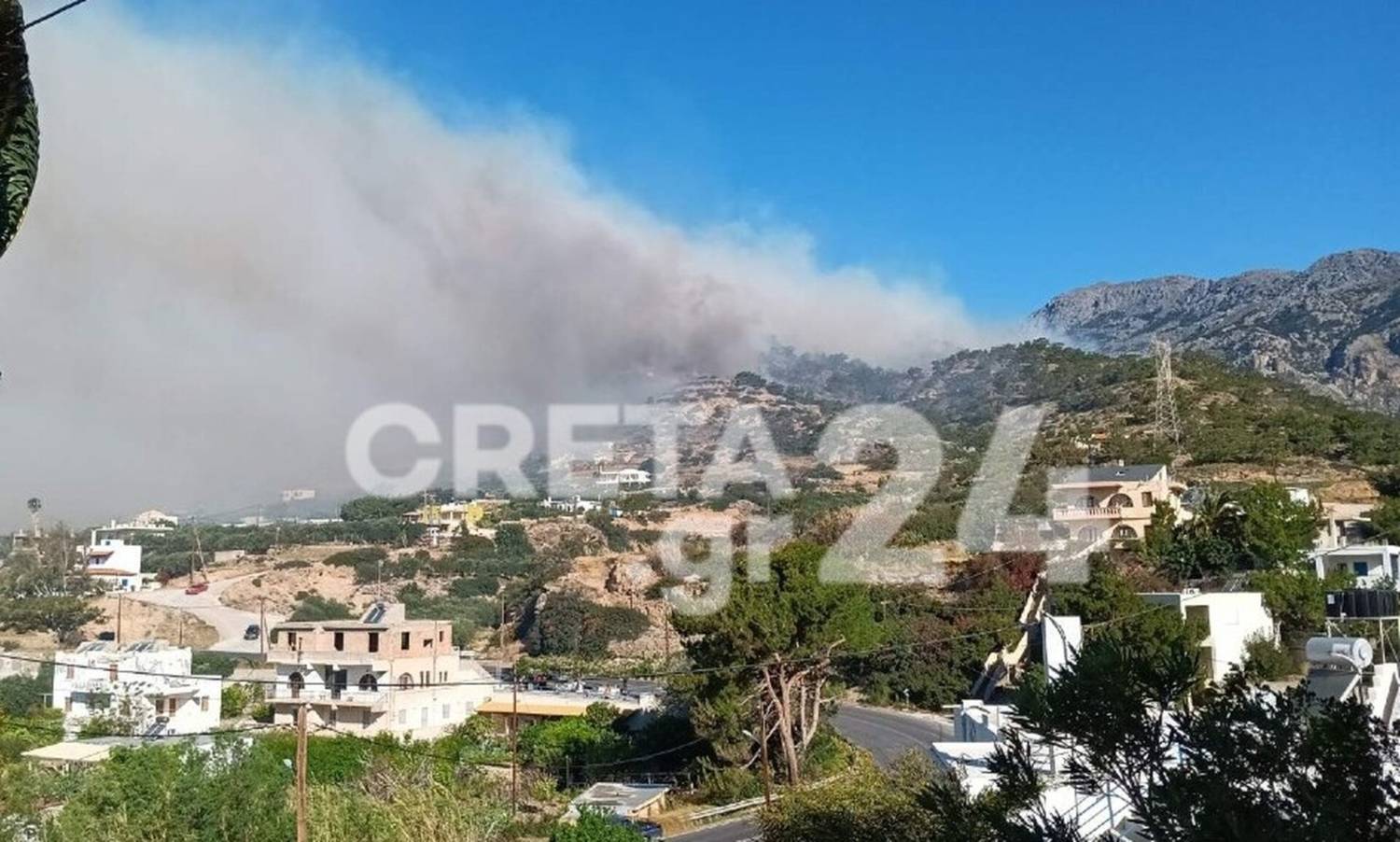 A wildfire on the Greek island of Crete prompted the evacuation of four residential settlements as firefighters battled the blaze with the help of helicopters