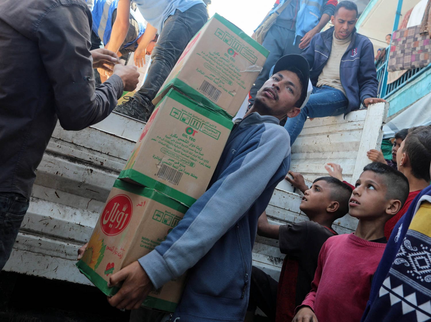 Israel is increasing aid flow into Gaza in response to international pressure, but the amount is still disputed