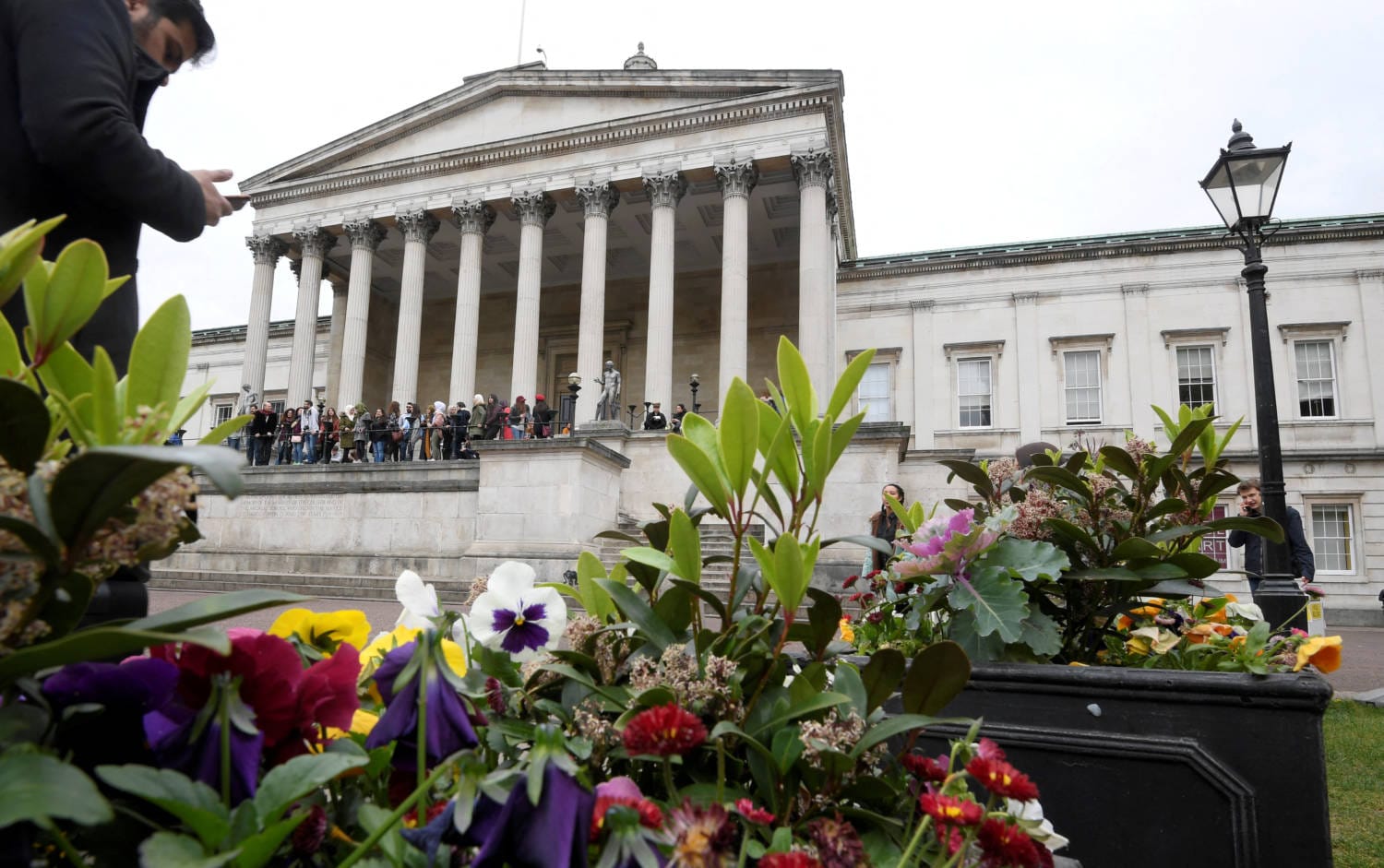 Britain should avoid further restricting international student numbers to prevent universities from collapsing, as foreign registrations for next year have plummeted