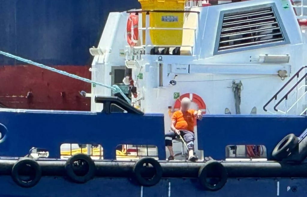 A crew member on a tugboat unloading jet fuel for RAF Akrotiri at Cape Gata was seen fishing and smoking a cigar instead of being vigilant