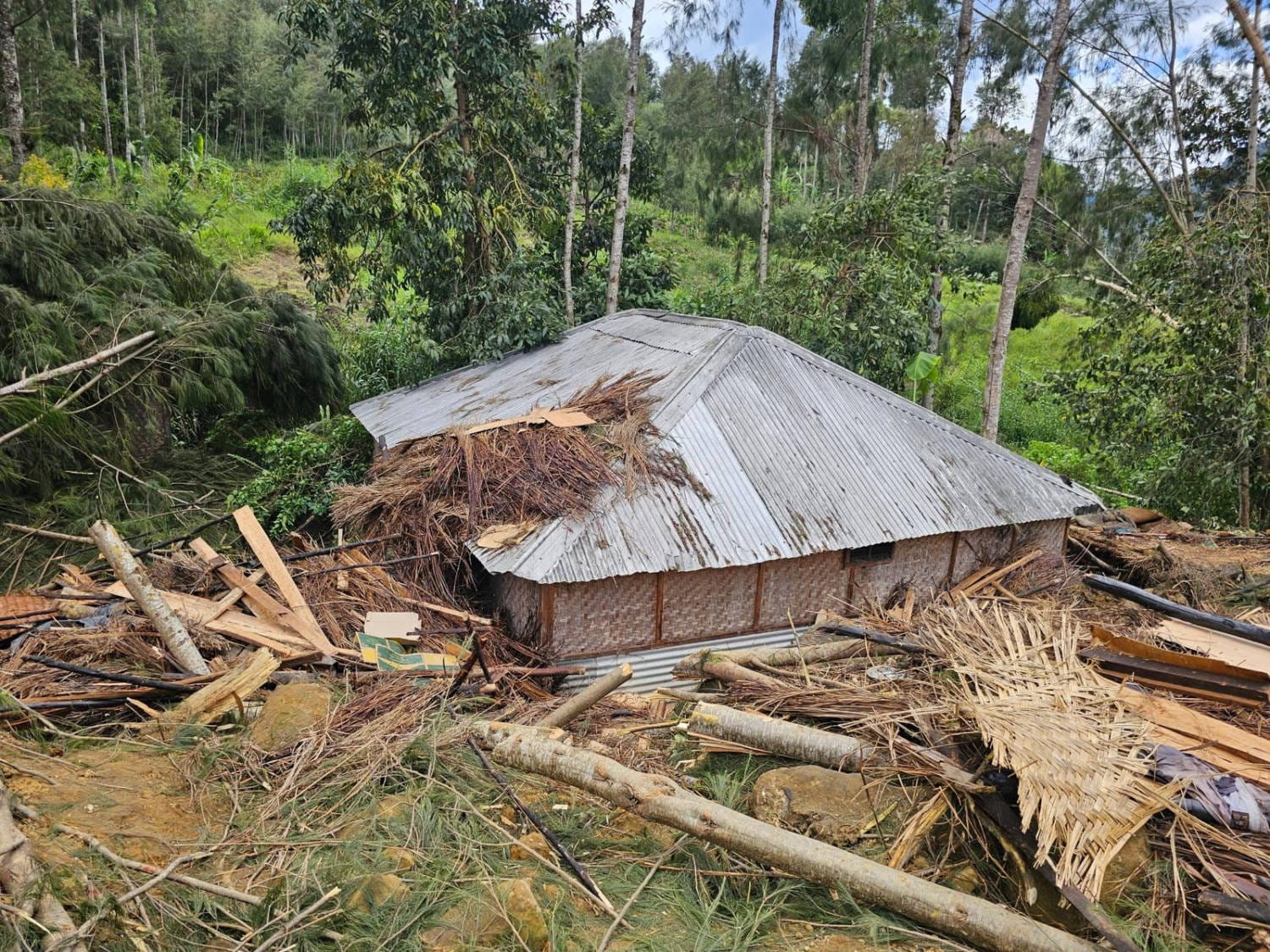Three bodies were found in the aftermath of a massive landslide in Papua New Guinea, with the death toll expected to rise